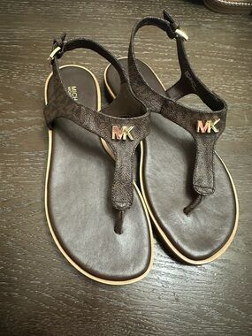 Michael Kors Dark Brown Leather T-Strap Sandals with Gold MK Accent